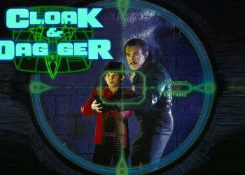 Box artwork for the 1984 movie "Cloak & Dagger" featuring a young boy and an older man in a targeting scope.