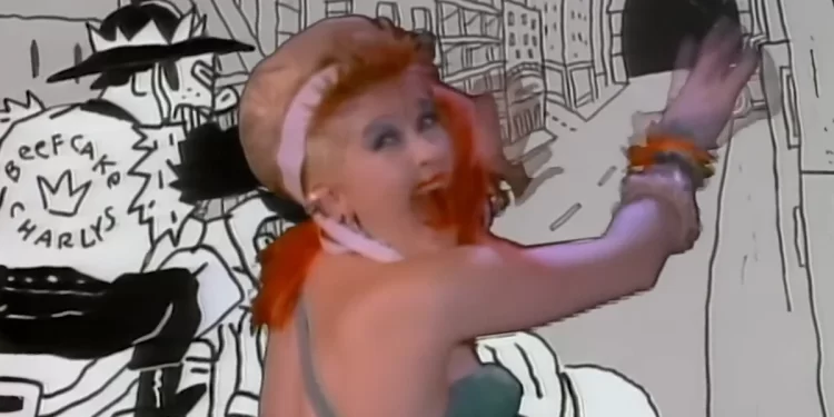 Cindy Lauper in colorful outfit dancing with cartoon background