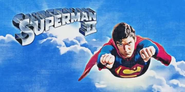 Superhero flying over cityscape at night